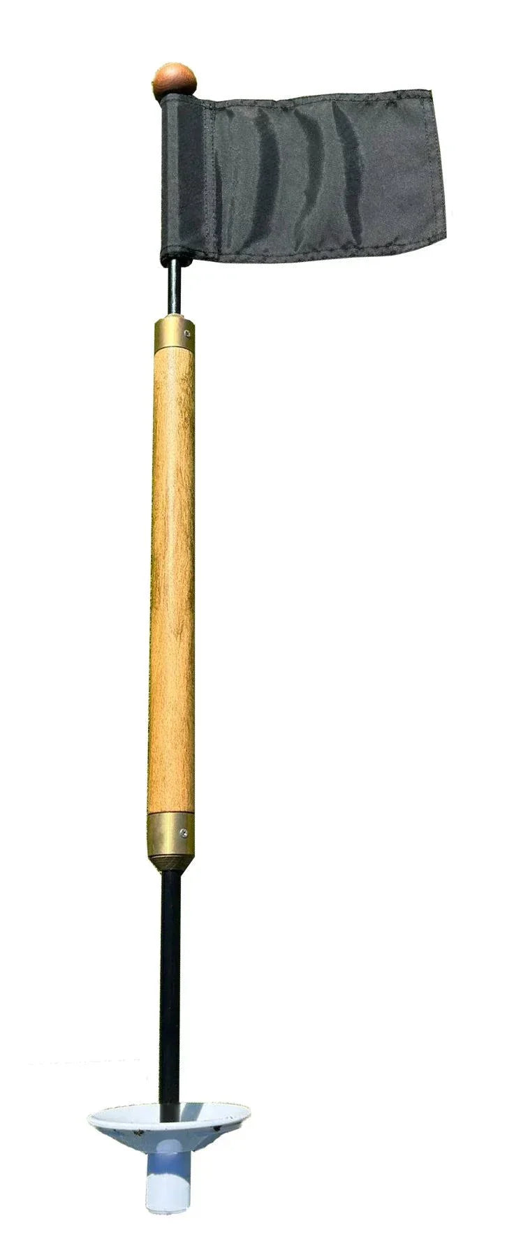 Mini smoked hickory timber golf flagsticks with gold connectors and white base on practice green